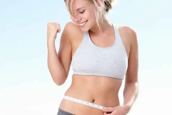 woman happy after fat reduction treatment Leyton Marshes