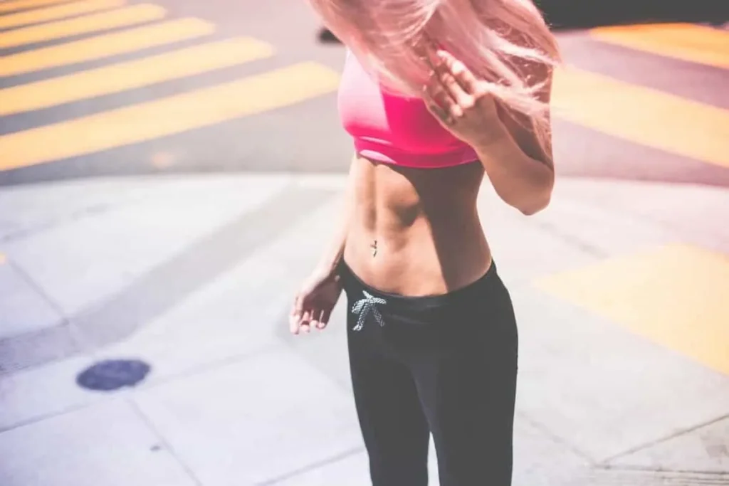 Woman with toned stomach after LA-EMS Body Sculpting Treatment Leyton Marshes